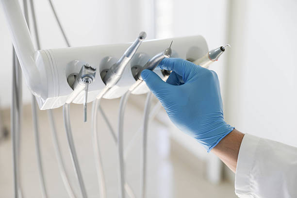Professional Tooth Extraction technician working in Shreveport, LA